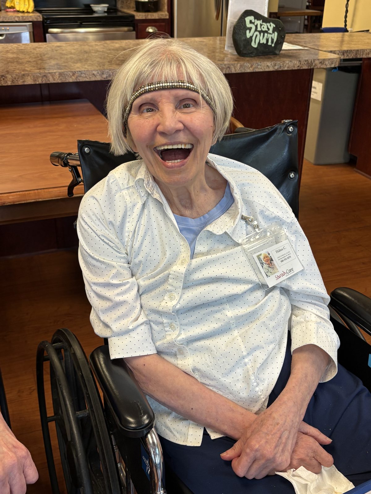 Smiling participant at SarahCare at Lakeside