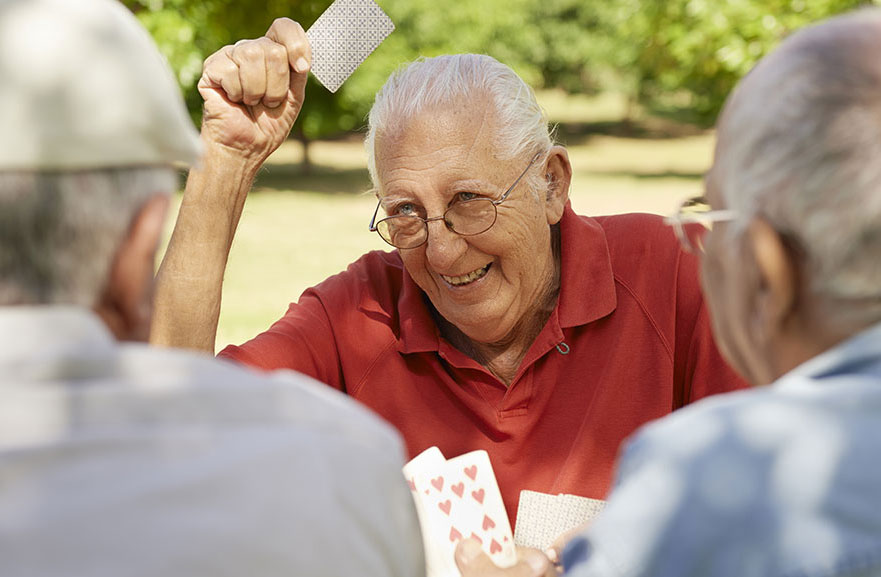 Seniors playing cards together